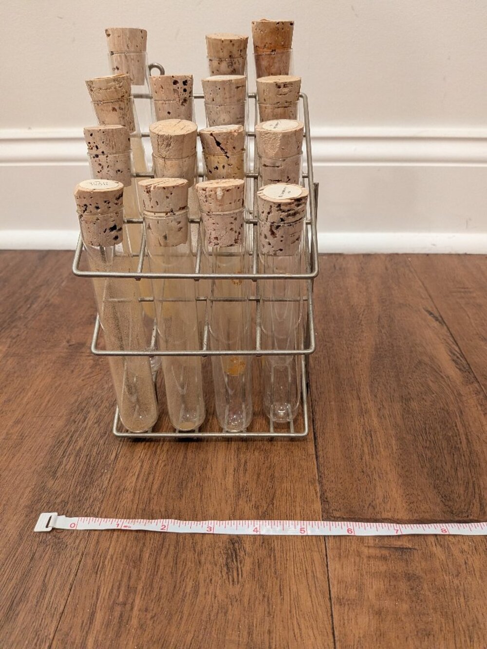 spice rack with 15 glass tubes with cork stoppers